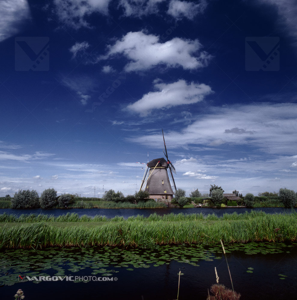 Cloudy summer day in Kinderdijk. south Holland by art photographer Boris Vargovic